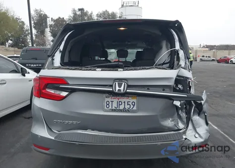 2021 Honda Odyssey Touring from USA, damaged, VIN 5FNRL6H88MB000217